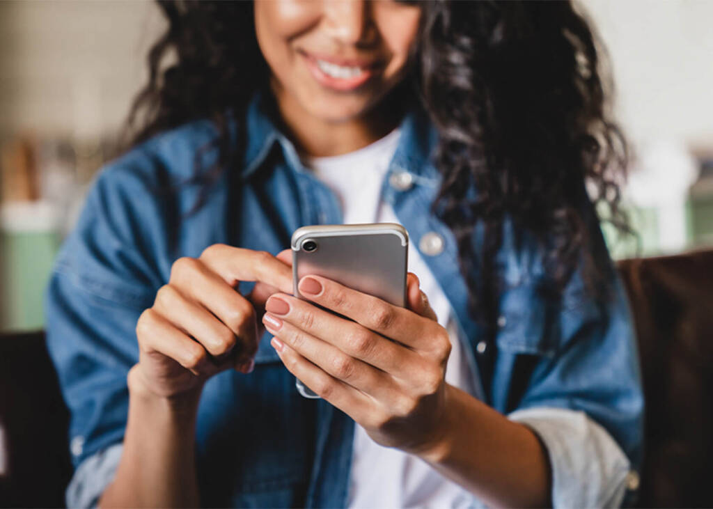 Woman looking at phone screen